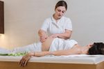 Pregnant woman having a relaxing Reiki treatment