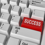 keyboard with red key "Success"
