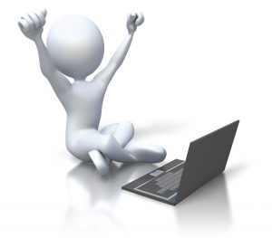 figure with arms up in celebration pose as it sits before open laptop