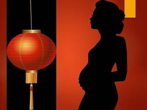 silhouette of pregnant woman plus a Chinese lantern for Mother's Day